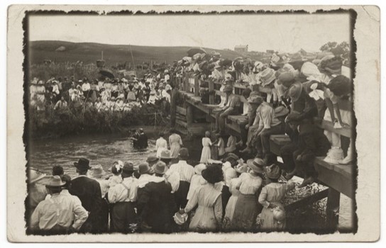 Another baptism image, this one from 1913, in Pibel, Nebraska. These public religious rituals flourished in the American South and the Midwest between 1880 and 1930.